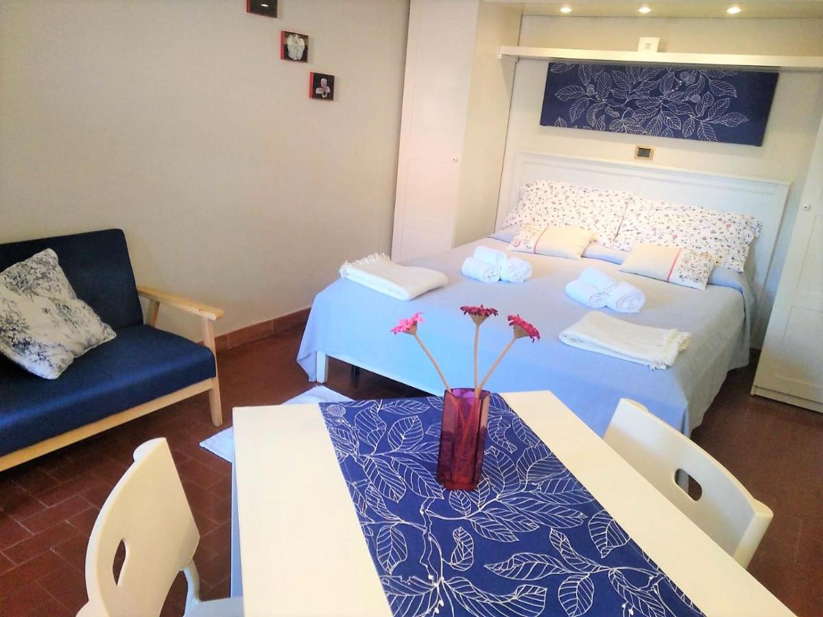 Il Gabbiano Aparthotel อาเมเกลีย ภายนอก รูปภาพ