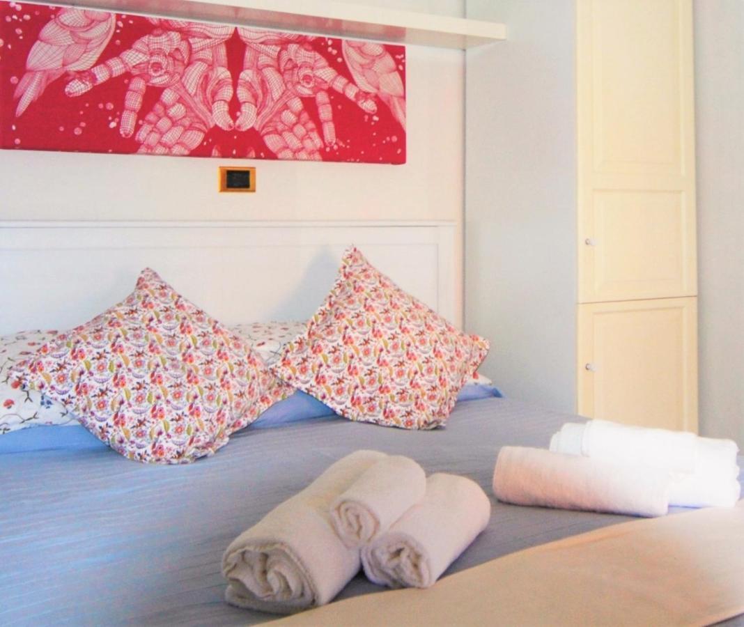 Il Gabbiano Aparthotel อาเมเกลีย ภายนอก รูปภาพ