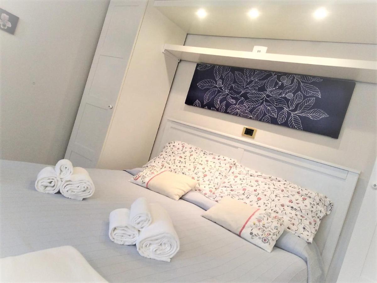 Il Gabbiano Aparthotel อาเมเกลีย ภายนอก รูปภาพ